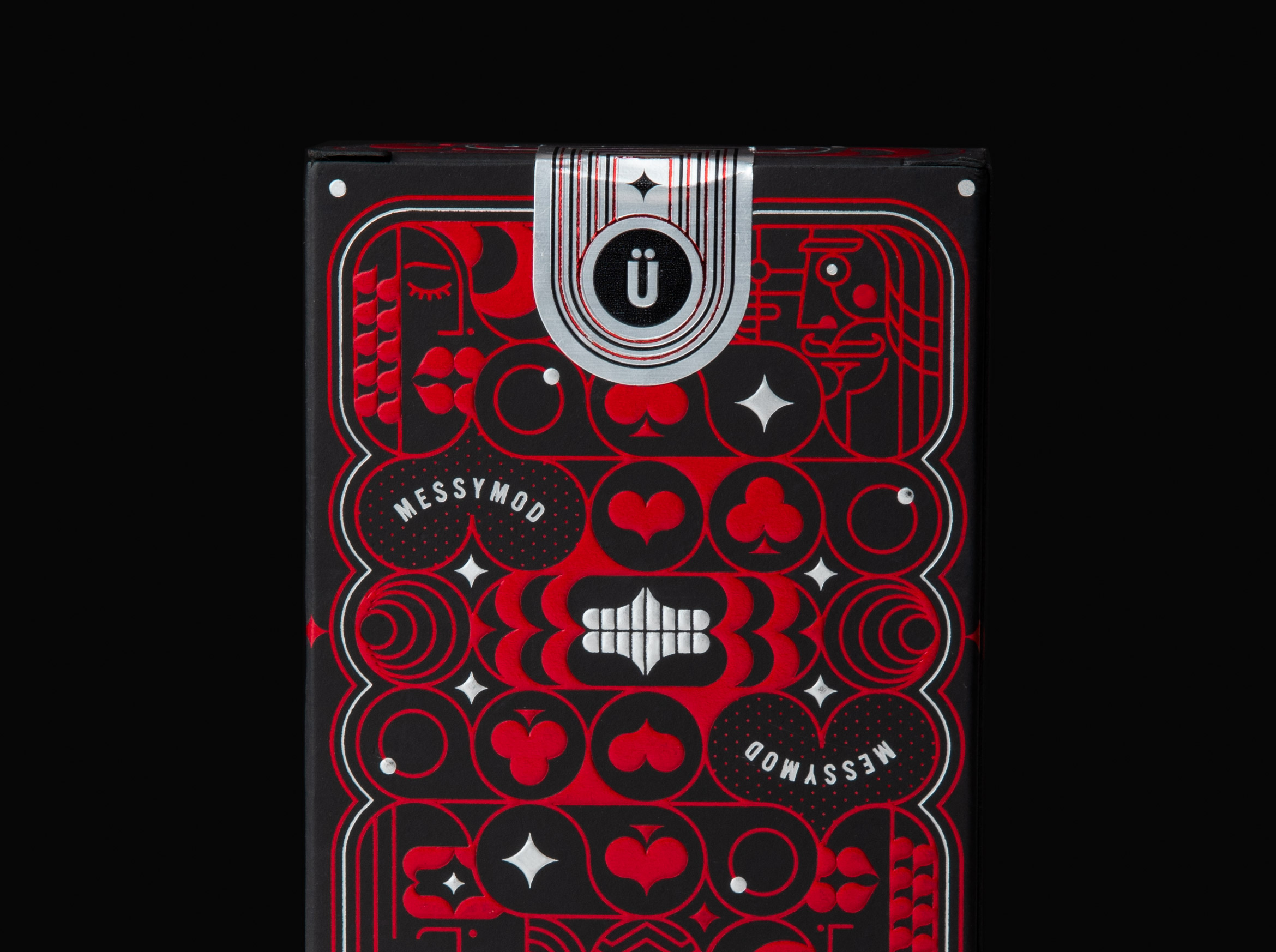 close up of messymod vol 2 cards with red and silver foil on black