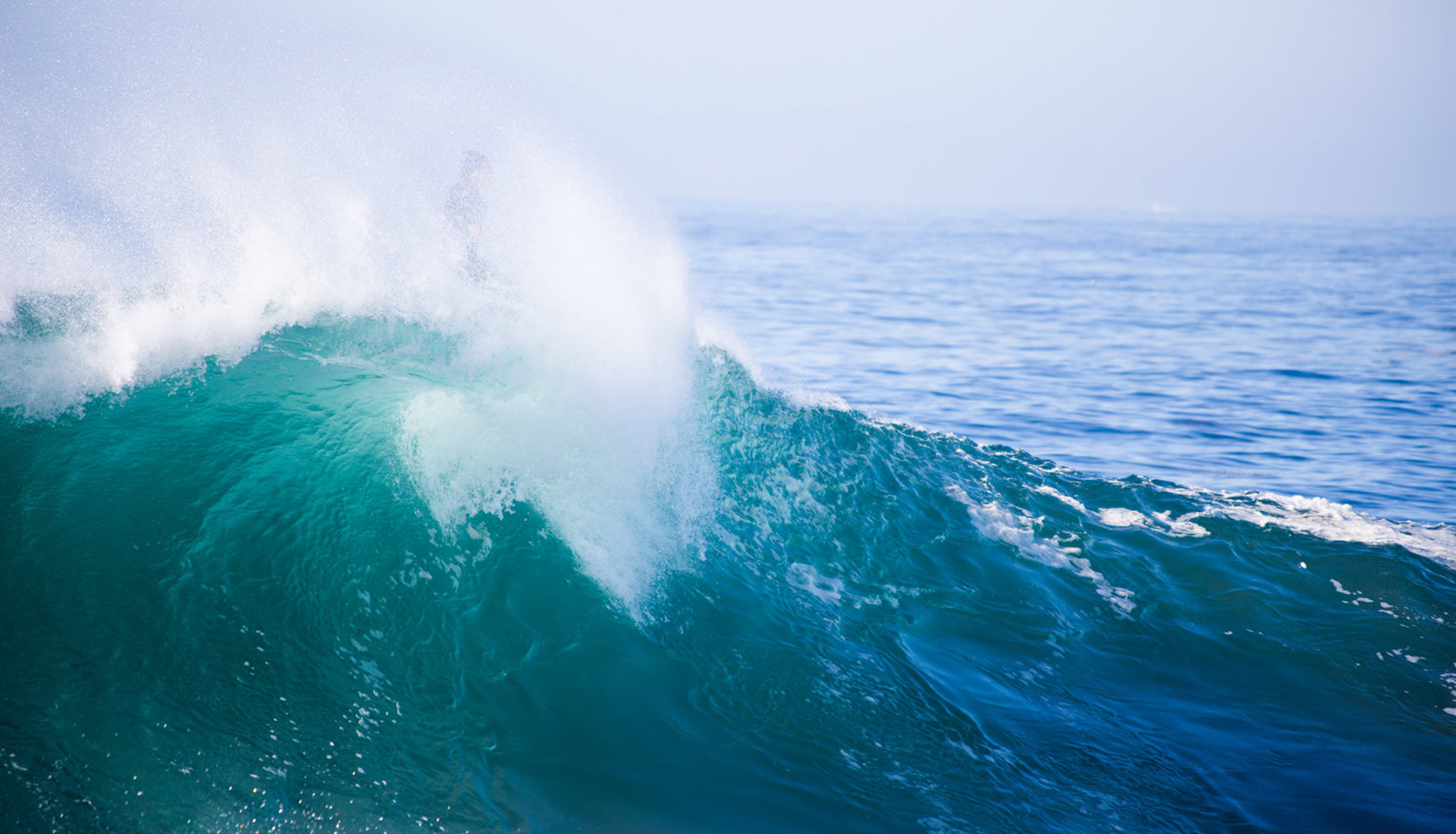 ocean waves blue and green with white splash