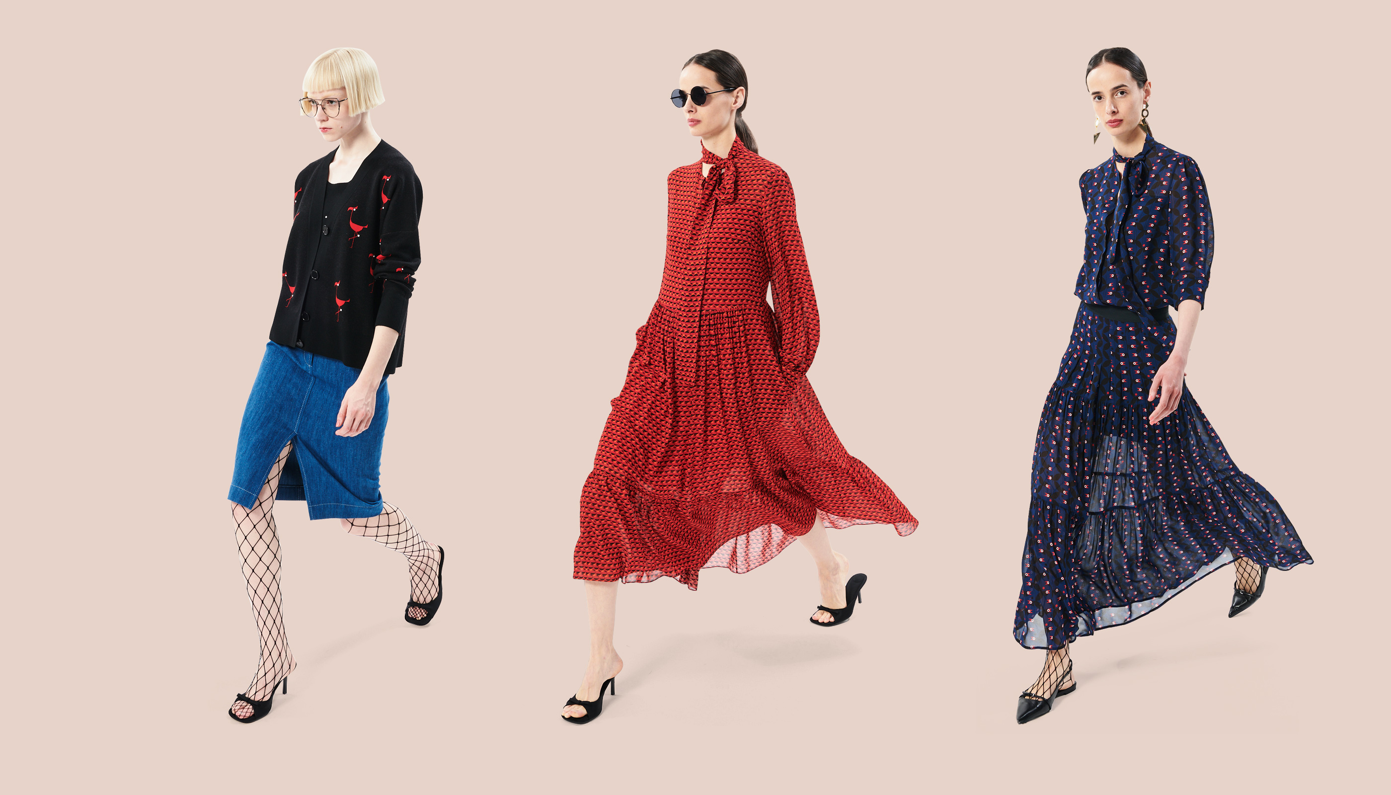 two brunette models wearing dresses with bird prints and a blonde model with glasses wearing a black flamingo cardigan and denim skirt.