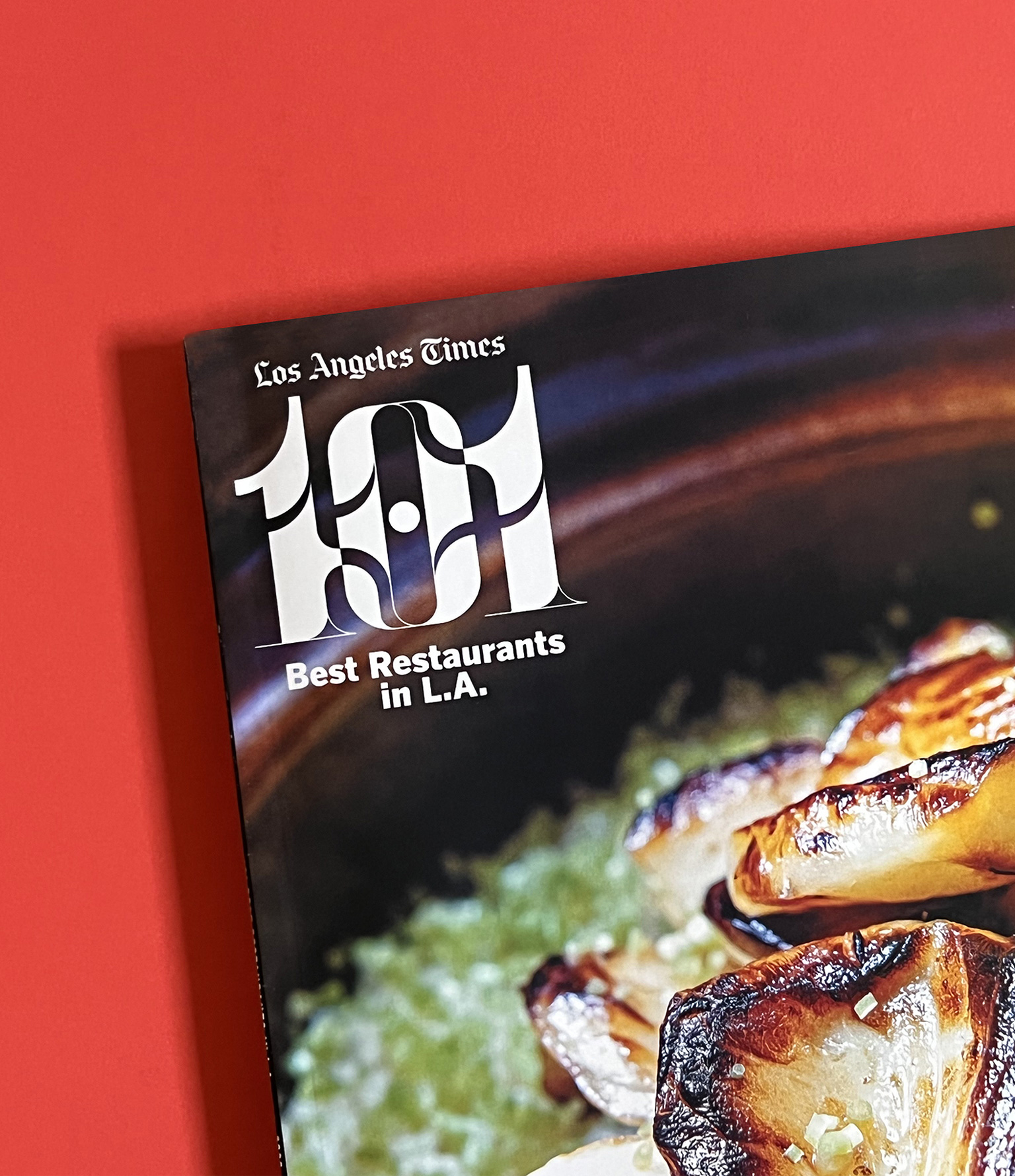 la times 101 best restaurants list magazine cover on red backdrop