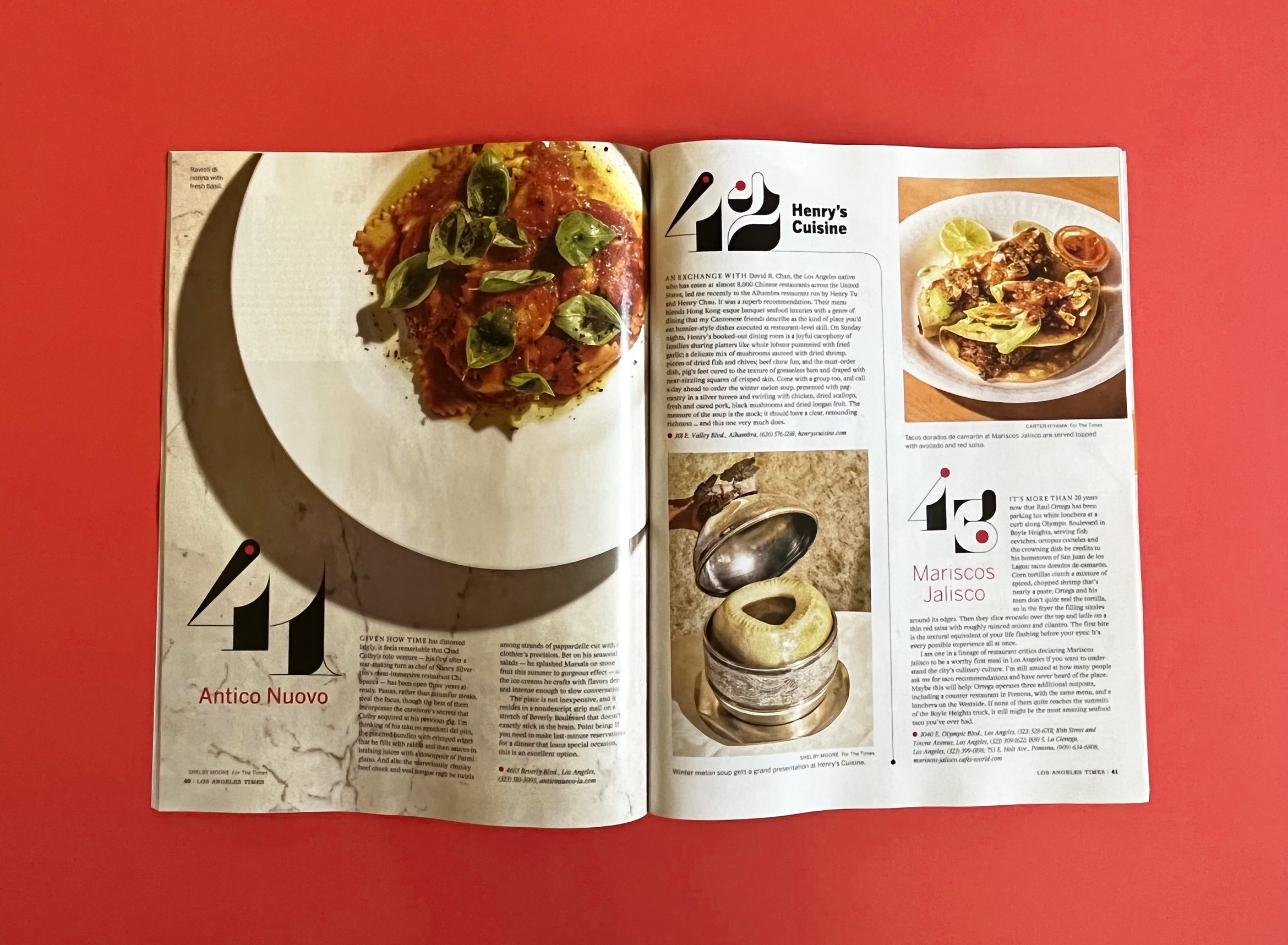 101 best restaurants magazine open to spread with food and details for numbers 41 to 43