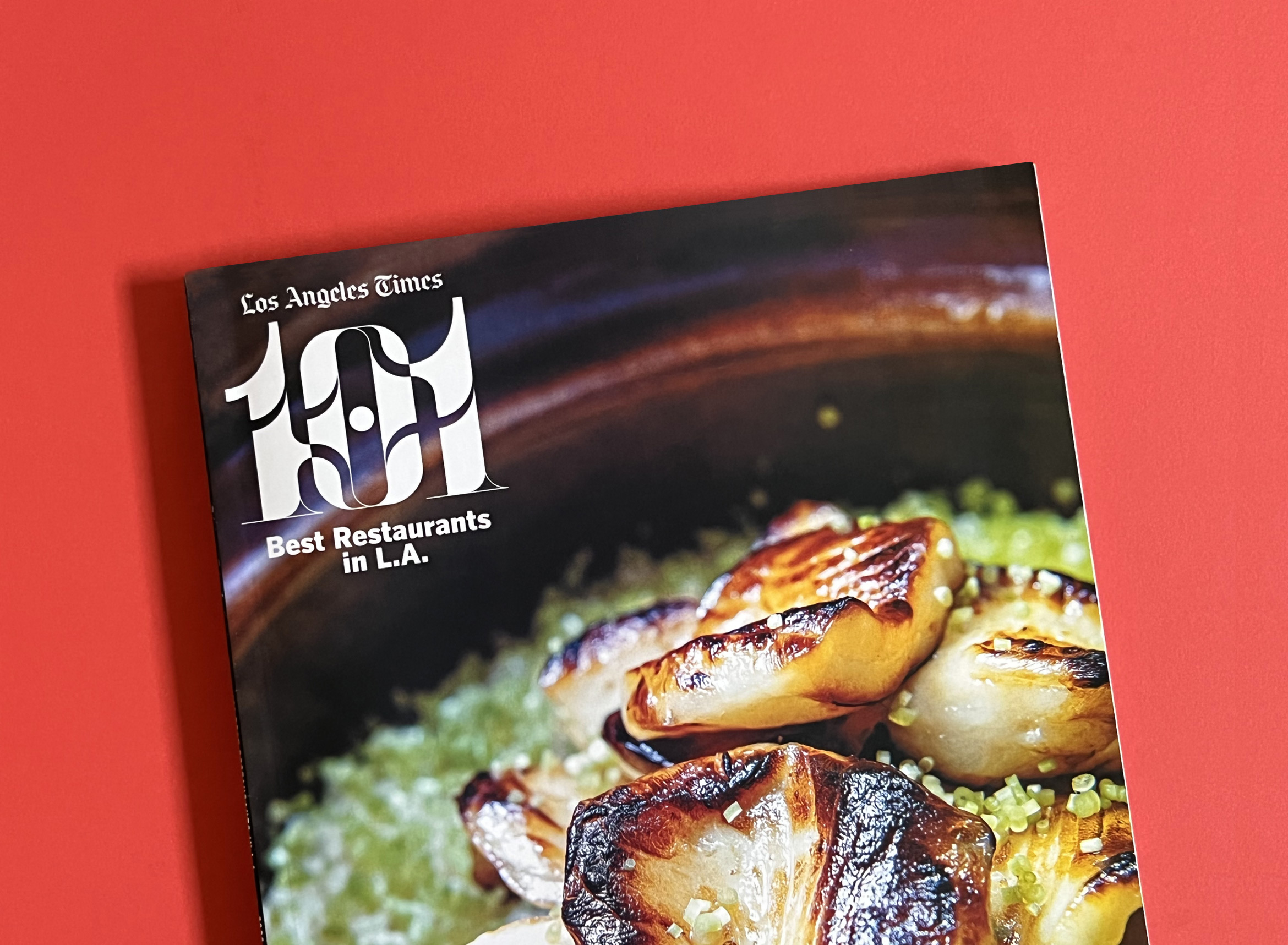 la times 101 best restaurants list magazine cover on red backdrop
